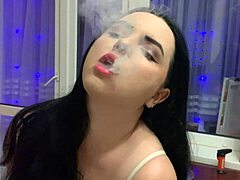 HD video of a black-haired amateur smoking and pleasuring herself