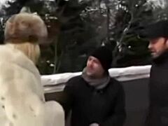 Snowy blonde prostitute gives blowjob to two French men
