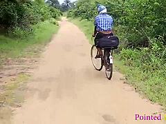 A Nigerian girl with big boobs and a bicycle gets assisted by a man in fixing her bike, leading to some romantic pussy fucking action