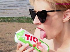 Amateur MILF teaches how to give a blowjob outdoors