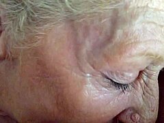 Mature blonde granny with long hair and big tits sucks hard in HD porn